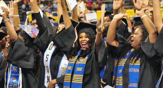 Students celebrating at commencement ceremony.